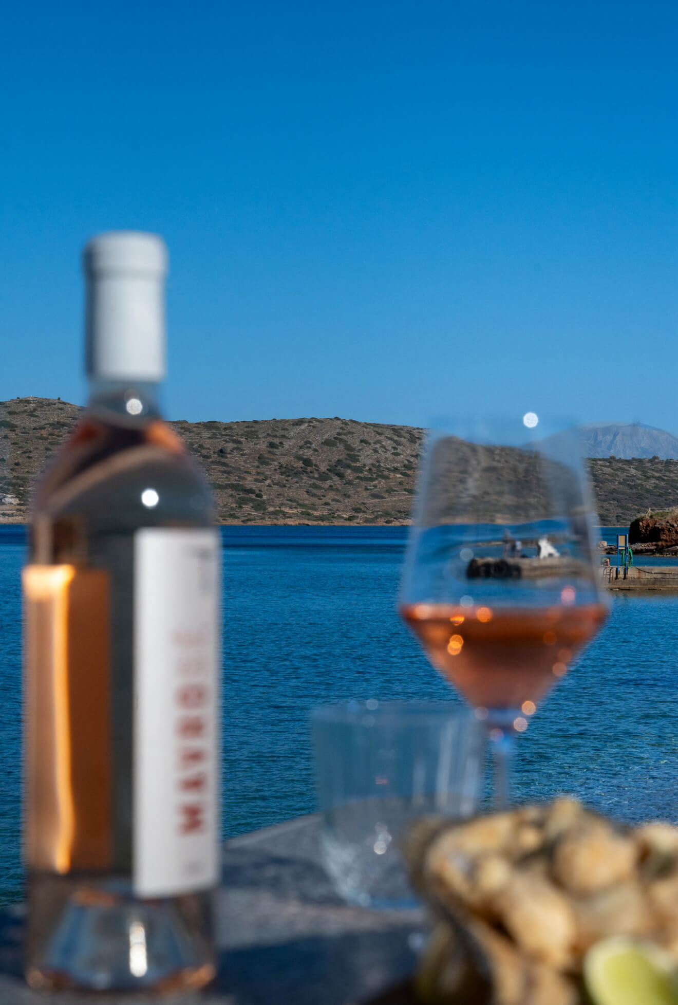 Rosé wine with Spinalonga view at Isla Cuisine